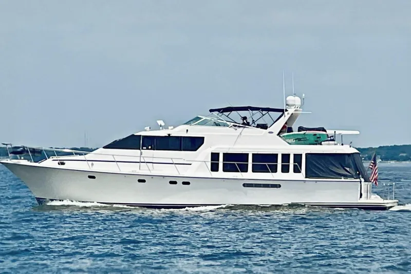 Chasing Sunsets Yacht Photos Pics 2000 Pacific Mariner 65 Motoryacht cruising on open water.