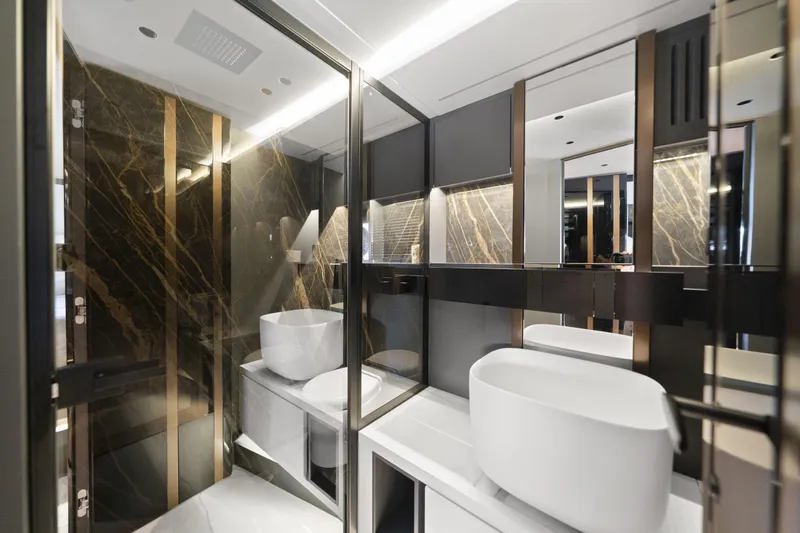 Explocean 3 Yacht Photos Pics Luxurious modern bathroom with marble accents in Explorer 62, 2025 model.