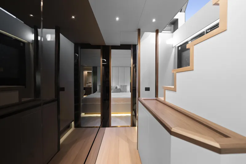 Explocean 3 Yacht Photos Pics Luxurious interior of 2025 Explorer 62 yacht with modern design and elegant lighting.