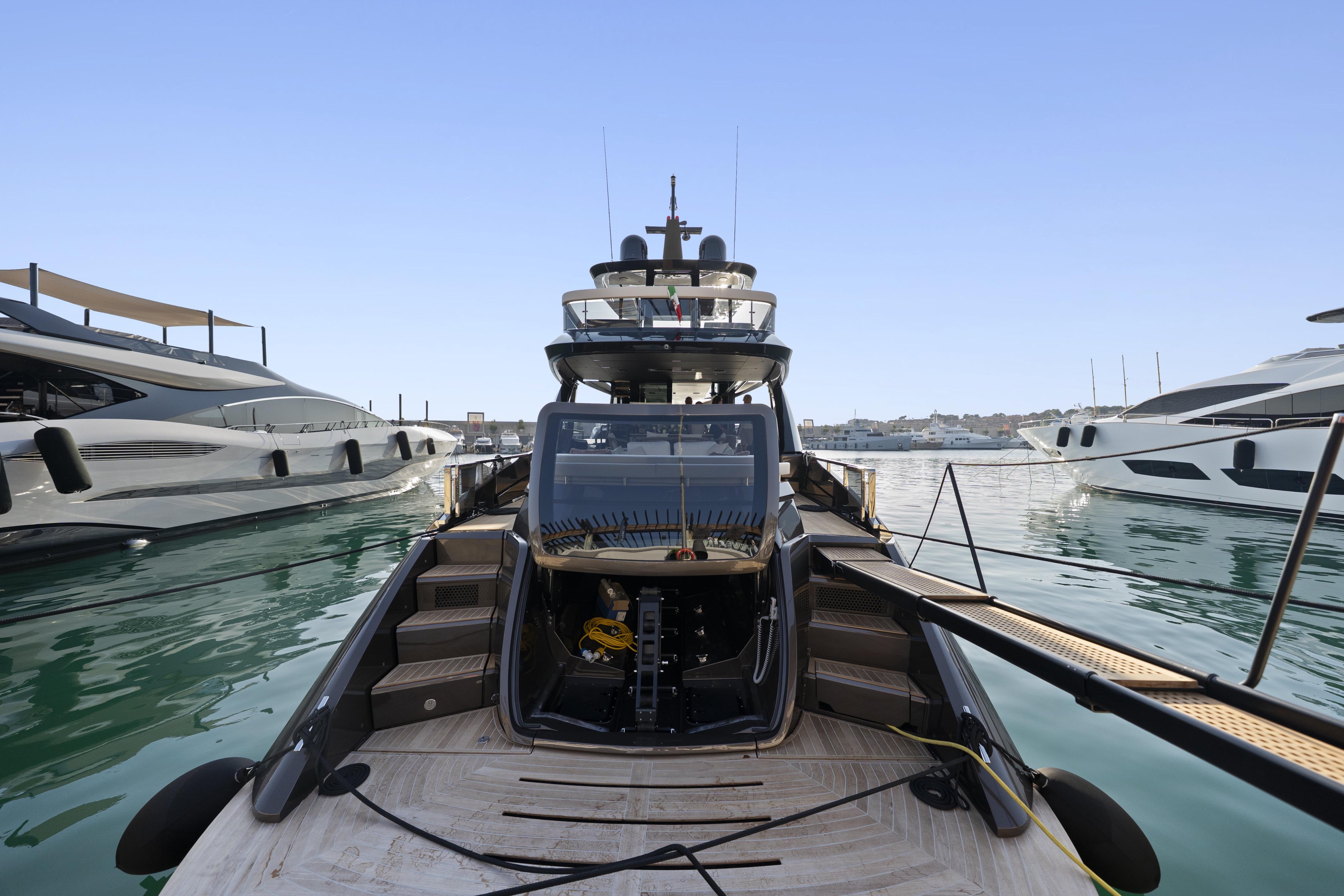Luxury Explorer 62 yacht docked in marina, 2025 model, sleek design, calm waters.