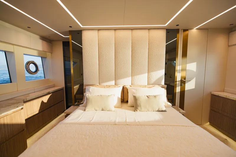 Explocean 3 Yacht Photos Pics Luxurious bedroom interior of 2025 Explorer 62 yacht with elegant design and ocean view.