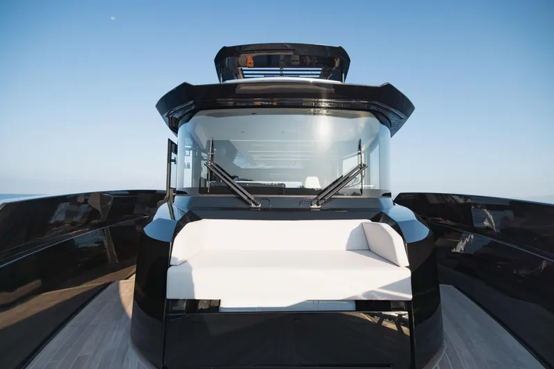 Explocean 3 Yacht Photos Pics 2025 Explorer 62 yacht with sleek design and modern windshield, set against a clear sky.