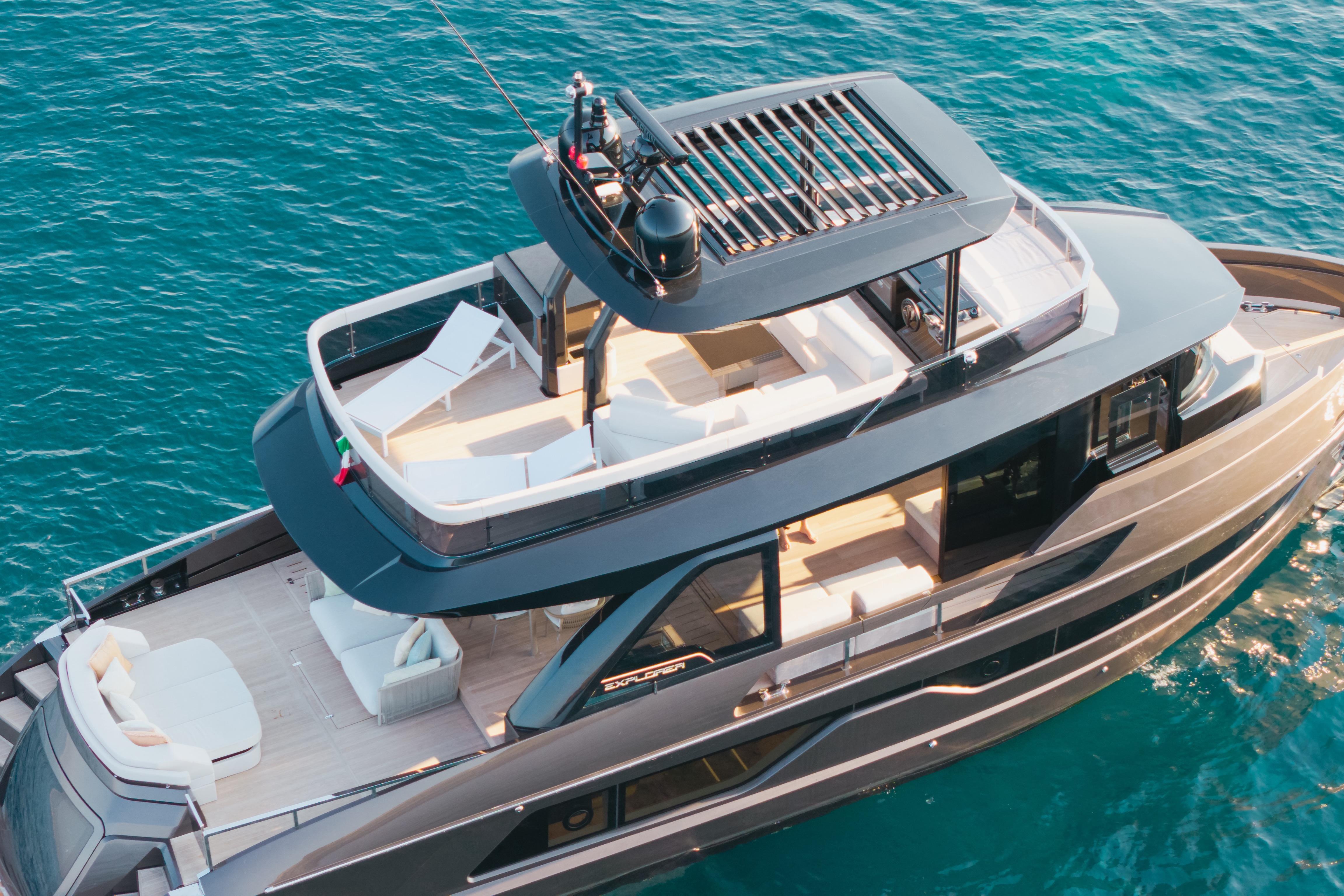 Luxurious 2025 Explorer 62 yacht cruising on clear blue waters.