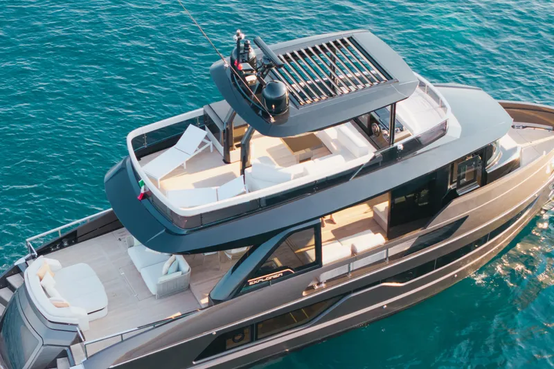 Explocean 3 Yacht Photos Pics Luxurious 2025 Explorer 62 yacht cruising on clear blue waters.
