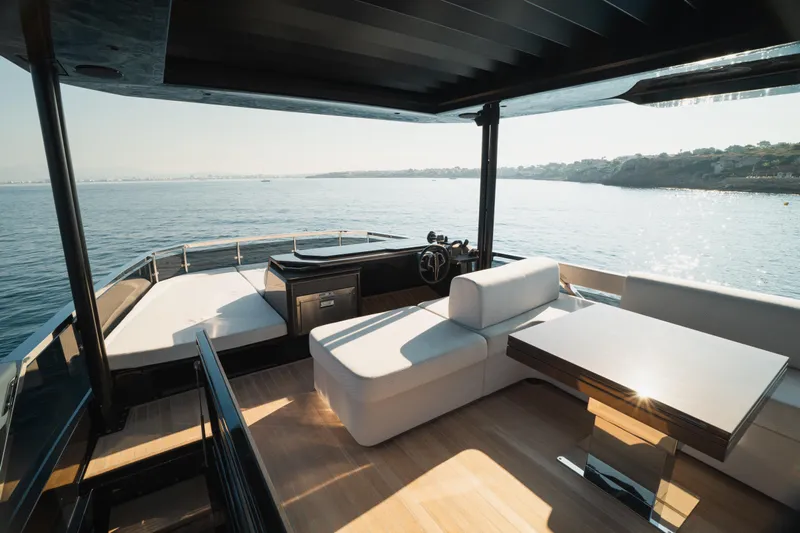 Explocean 3 Yacht Photos Pics Luxurious 2025 Explorer 62 yacht interior with modern seating and ocean view.