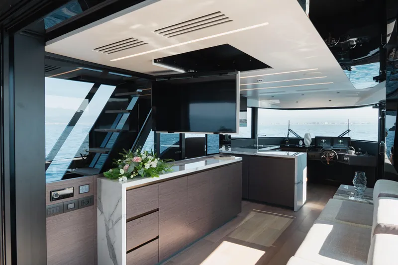 Explocean 3 Yacht Photos Pics Luxurious interior of 2025 Explorer 62 yacht with modern design and ocean view.