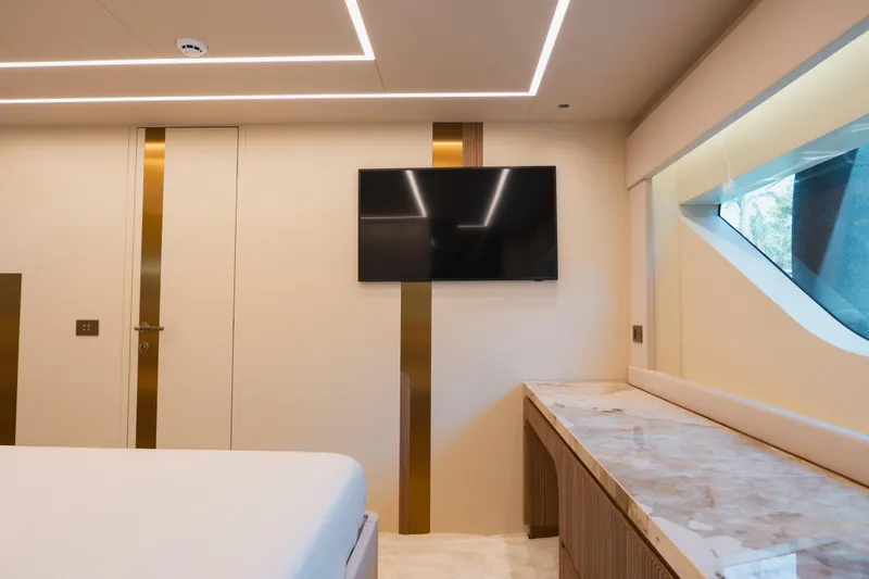 Explocean 3 Yacht Photos Pics Luxurious interior of 2025 Explorer 62 yacht with modern design and large window.