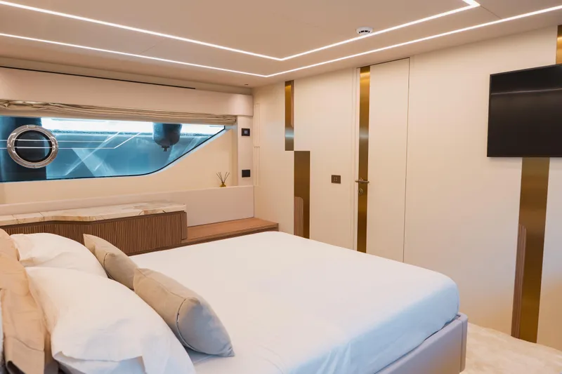 Explocean 3 Yacht Photos Pics Luxurious 2025 Explorer 62 yacht bedroom with modern design and elegant furnishings.