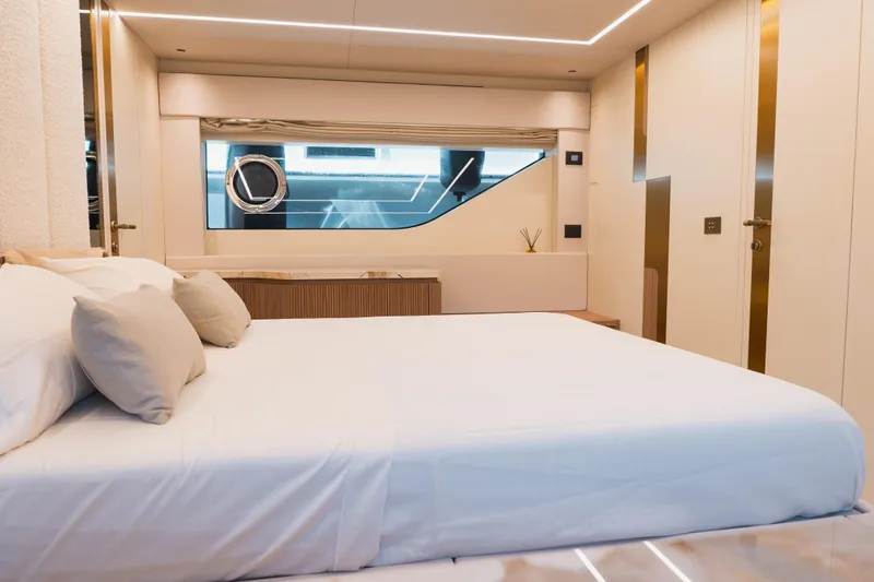 Explocean 3 Yacht Photos Pics Luxurious 2025 Explorer 62 yacht bedroom with modern design and elegant decor.