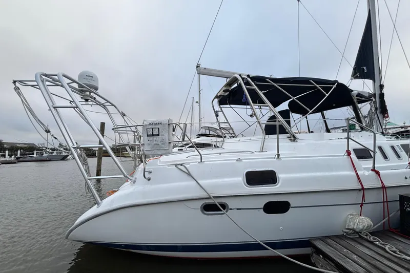 Kraken Yacht Photos Pics 2000 Hunter Passage 450 sailboat docked at marina, featuring sleek design and modern equipment.