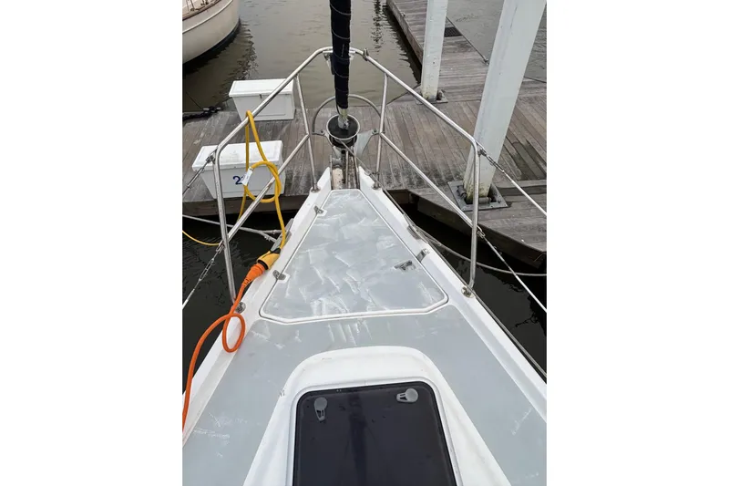 Kraken Yacht Photos Pics Bow view of 2000 Hunter Passage 450 sailboat docked at marina.