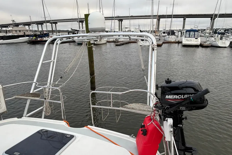 Kraken Yacht Photos Pics Hunter Passage 450 sailboat, 2000 model, docked with Mercury outboard motor.