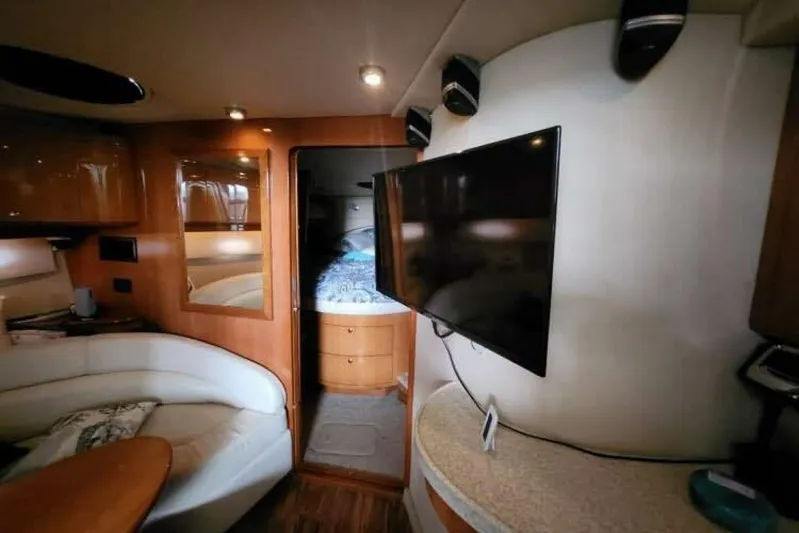  Yacht Photos Pics Interior of 2007 Regal Commodore 4460 yacht with cozy seating and modern amenities.