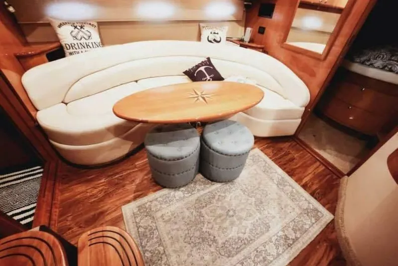  Yacht Photos Pics Luxurious interior of 2007 Regal Commodore 4460 yacht with elegant seating and decor.