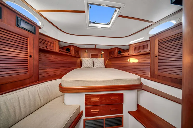 Midnight Yacht Photos Pics 2014 Hinckley Picnic Boat 37 MKIII cabin with wood paneling and skylight.