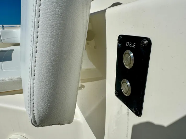 Yacht Photos Pics Close-up of 2020 Cobia 350 Center Console boat's table control buttons.