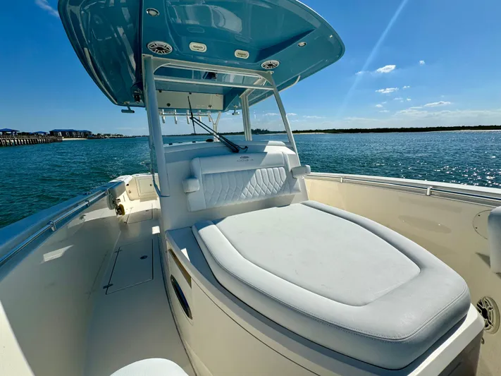  Yacht Photos Pics 2020 Cobia 350 Center Console boat on water, featuring spacious seating and sleek design.