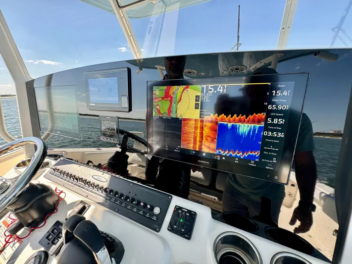  Yacht Photos Pics Cobia 350 Center Console 2020 dashboard with advanced navigation and sonar display.