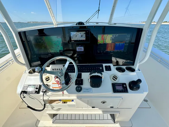  Yacht Photos Pics 2020 Cobia 350 Center Console boat dashboard with advanced navigation and control systems.