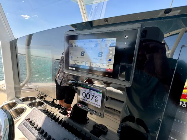  Yacht Photos Pics 2020 Cobia 350 Center Console dashboard with navigation display and controls.