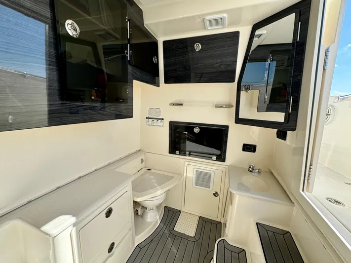  Yacht Photos Pics 2020 Cobia 350 Center Console interior with modern amenities and sleek design.