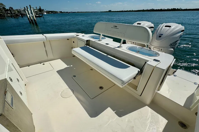  Yacht Photos Pics 2020 Cobia 350 Center Console boat with seating, ocean view, and twin engines.