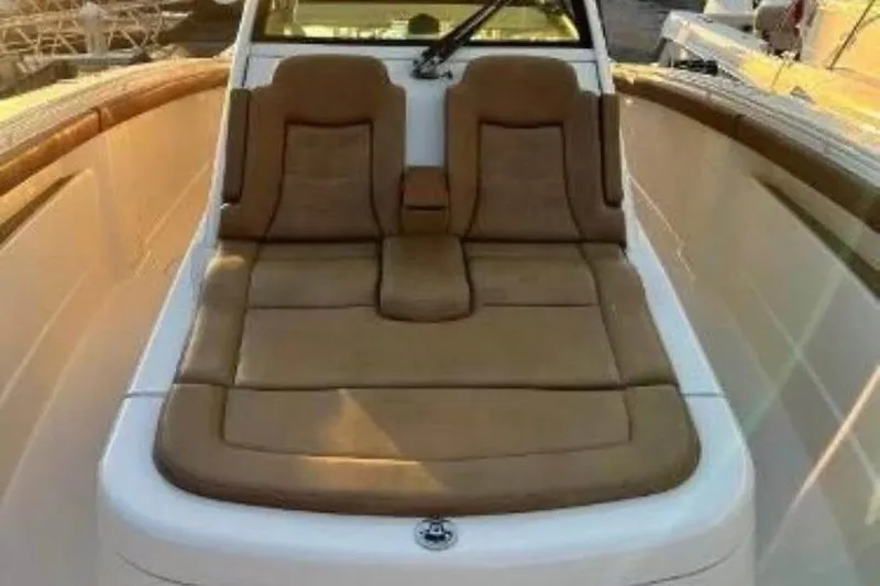 Yacht Photos Pics 2019 Scout 420 LXF boat with luxurious tan seating and sleek design.