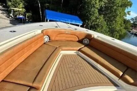  Yacht Photos Pics 2019 Scout 420 LXF boat with luxurious tan seating and wood accents.