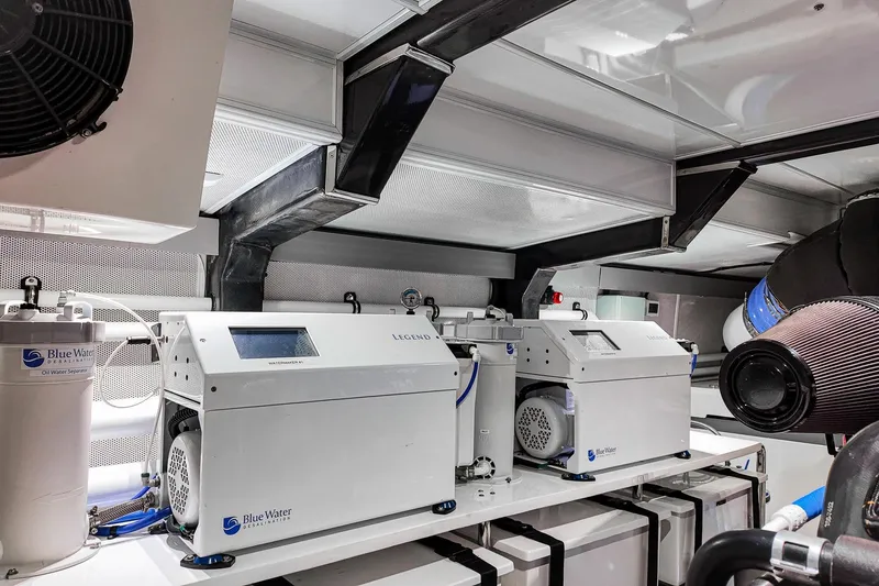 Top Times Yacht Photos Pics Engine room of 2022 Marlow Voyager Series yacht with Blue Water desalination system.