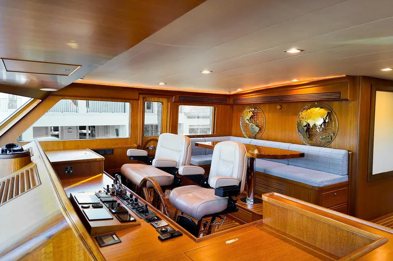 Top Times Yacht Photos Pics Luxurious 2022 Marlow Voyager Series yacht interior with plush seating and elegant wood finish.