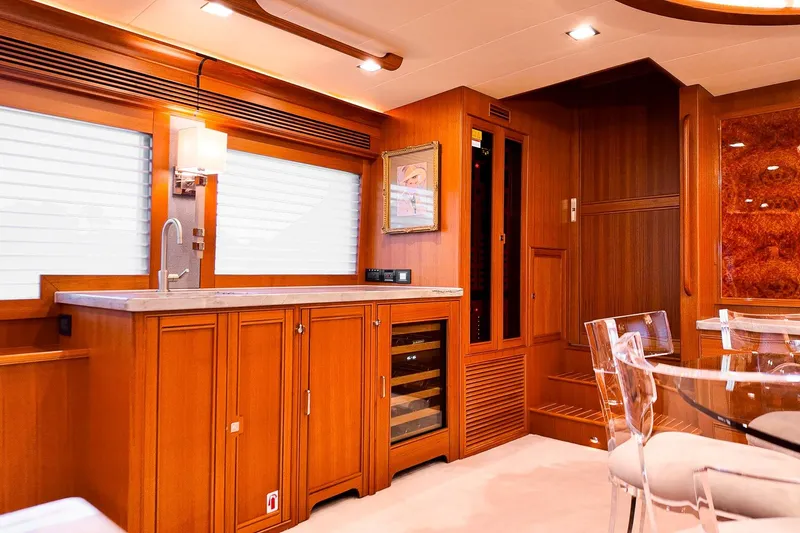 Top Times Yacht Photos Pics Luxurious Marlow Voyager Series 2022 yacht interior with elegant wood cabinetry and modern fixtures.