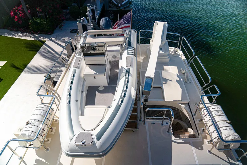 Top Times Yacht Photos Pics Aerial view of 2022 Marlow Voyager Series yacht with tender on deck.