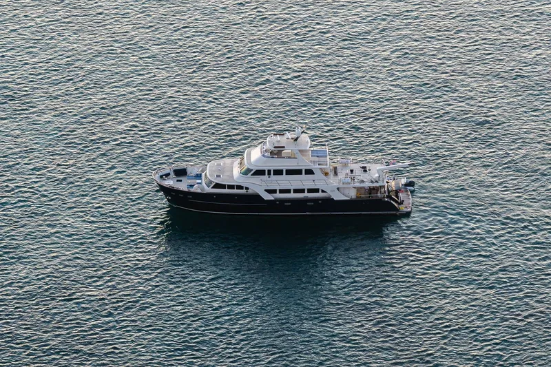 Top Times Yacht Photos Pics Luxury Marlow Voyager Series yacht, 2022 model, cruising on calm ocean waters.