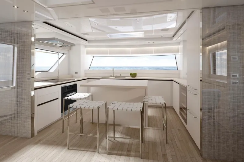  Yacht Photos Pics Luxurious interior of 2025 Sanlorenzo SX88 yacht with modern kitchen and ocean view.