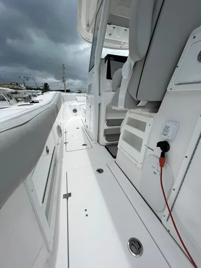  Yacht Photos Pics 2023 Sea Fox 328 Commander boat deck with sleek design and modern features.