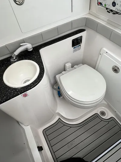  Yacht Photos Pics 2023 Sea Fox 328 Commander boat bathroom with sink and toilet.