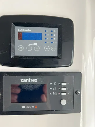  Yacht Photos Pics Control panels on a 2023 Sea Fox 328 Commander boat, featuring Webasto and Xantrex systems.
