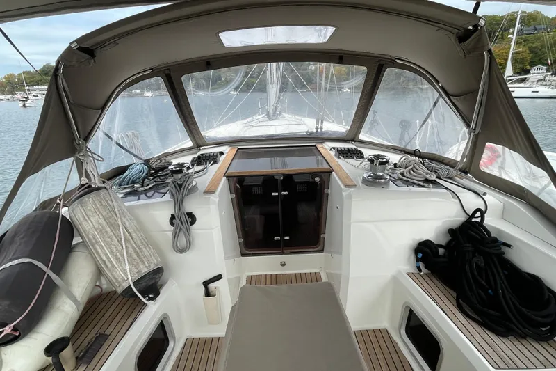  Yacht Photos Pics Cockpit of 2012 Jeanneau Sun Odyssey 509 sailboat with ropes and equipment.