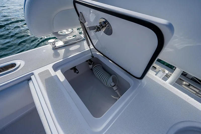 T/t Waterfront Yacht Photos Pics Open storage compartment on 2013 Bahama Quad V10's boat deck.