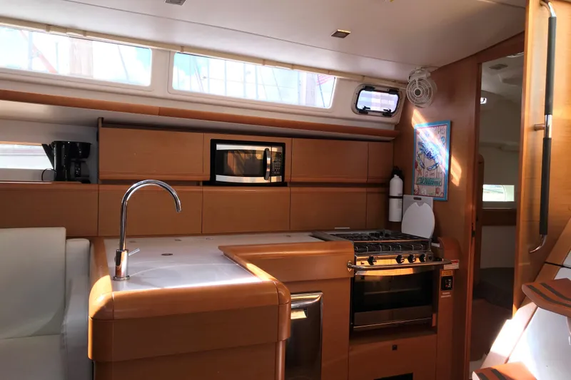 Northern Lights Yacht Photos Pics Interior of 2015 Jeanneau Sun Odyssey 469 yacht kitchen with modern appliances.