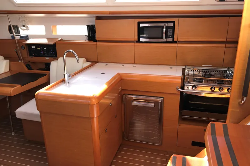 Northern Lights Yacht Photos Pics Interior of 2015 Jeanneau Sun Odyssey 469 yacht kitchen with modern amenities.