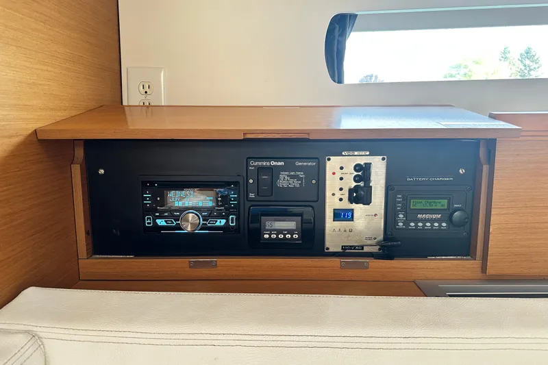 Northern Lights Yacht Photos Pics Control panel of a 2015 Jeanneau Sun Odyssey 469 yacht, featuring navigation and battery systems.
