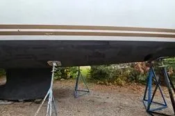 Northern Lights Yacht Photos Pics 2015 Jeanneau Sun Odyssey 469 sailboat on stands, hull view.