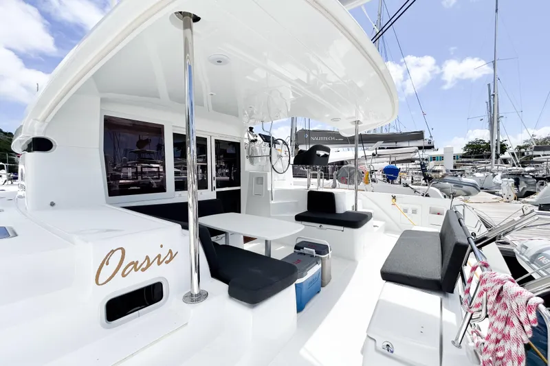 Oasis Yacht Photos Pics Luxurious 2025 Lagoon 40 catamaran "Oasis" with spacious outdoor seating and modern design.