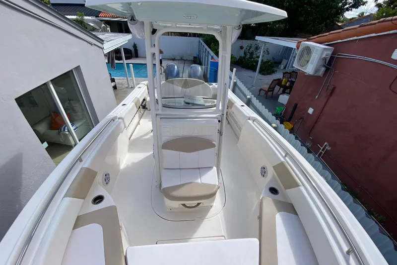  Yacht Photos Pics 2018 Robalo R242 Center Console boat with spacious seating and modern design.