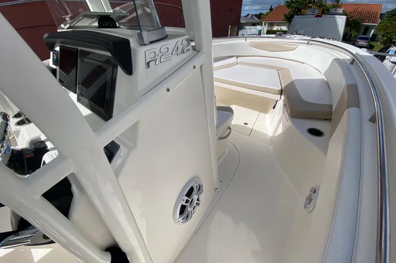  Yacht Photos Pics 2018 Robalo R242 Center Console boat interior with seating and console view.