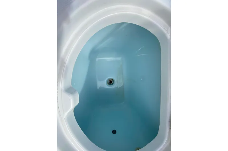  Yacht Photos Pics Livewell in 2018 Robalo R242 Center Console boat, filled with water.