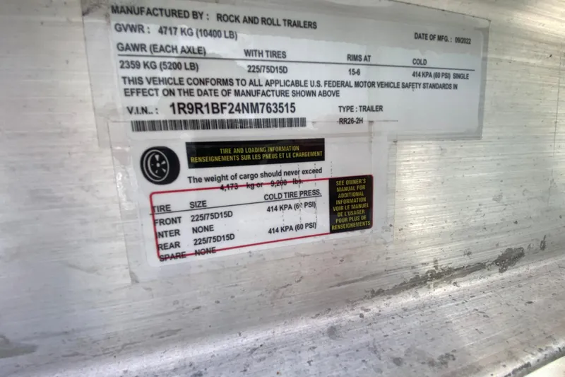  Yacht Photos Pics 2018 Robalo R242 Center Console trailer specifications label with tire and weight details.