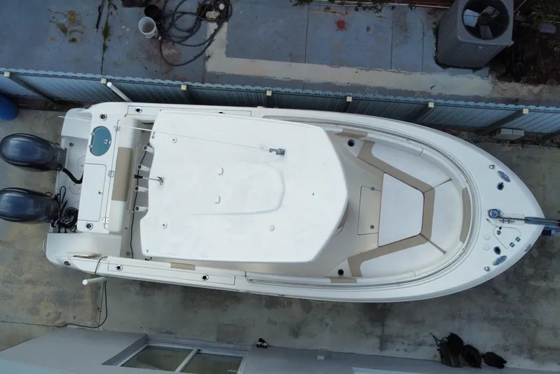  Yacht Photos Pics Overhead view of 2018 Robalo R242 Center Console boat docked.