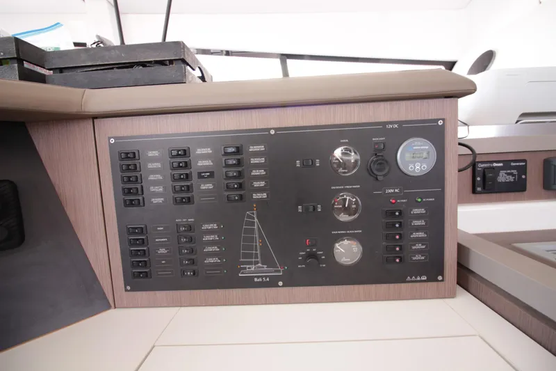 Amura Yacht Photos Pics Control panel of a 2021 Bali 5.4 yacht, featuring various switches and gauges.